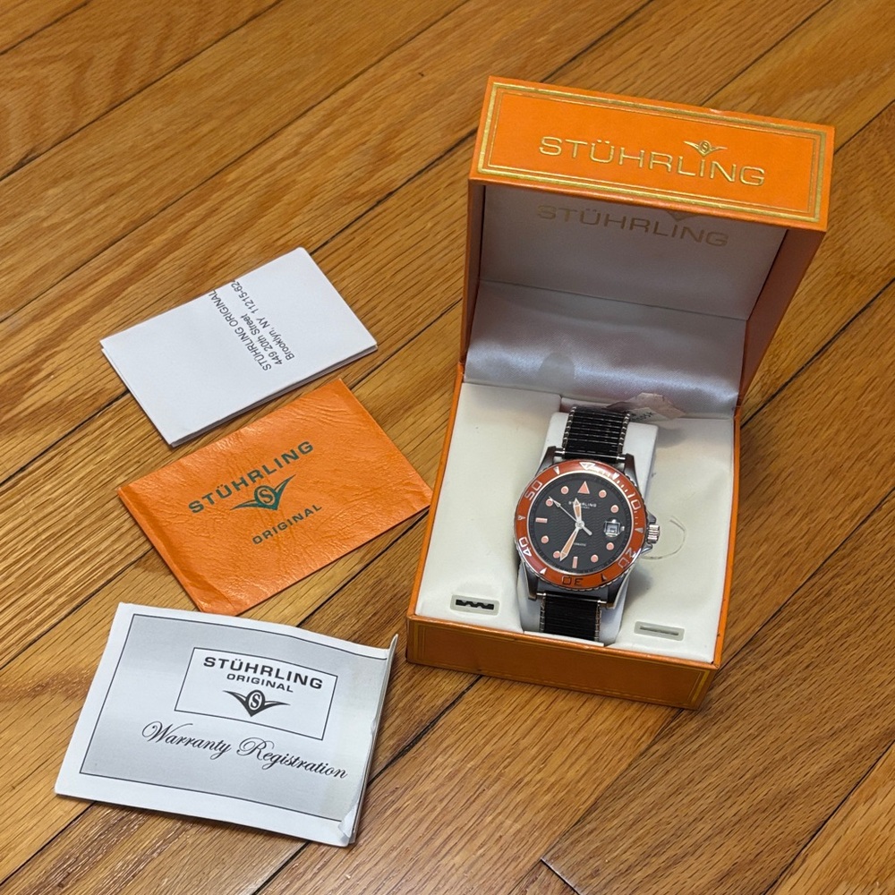 Men's Orange and Black Stuhrling Watch